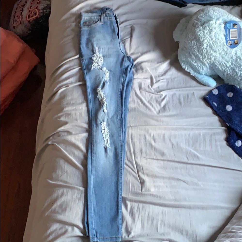blue ripped jeans